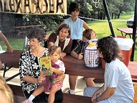 alexander reuinon with grandchildren and cherie