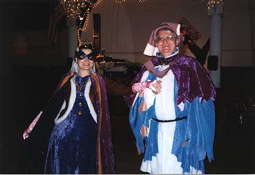 Sandra and Ron in queen and king costumes.